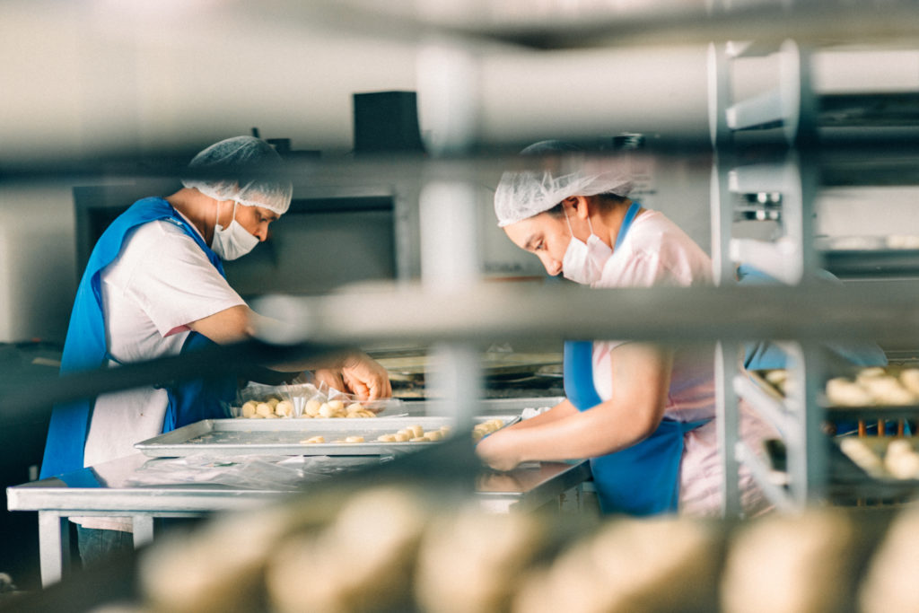 Workers filling orders at Bakery Workshop