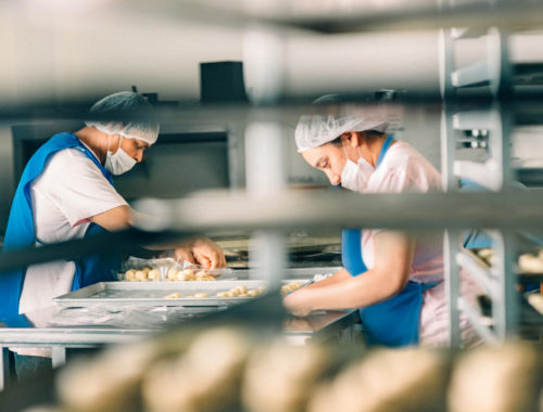 Mexican Workers filling orders at Bakery Workshop